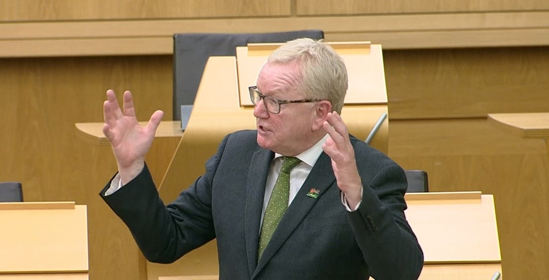 An image of the Convener of the Committee, Jackson Carlaw MSP, speaking in the Debating Chamber